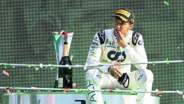 Pierre Gasly, AlphaTauri, 1st position, sits down on the podium